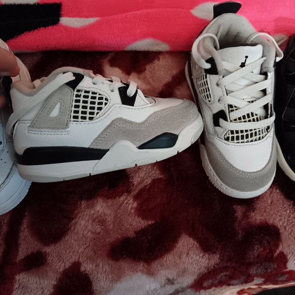 Baby /kid shoes made by Jordan size 7c all black Jordan Xl,4 \'s,nikes,air forces